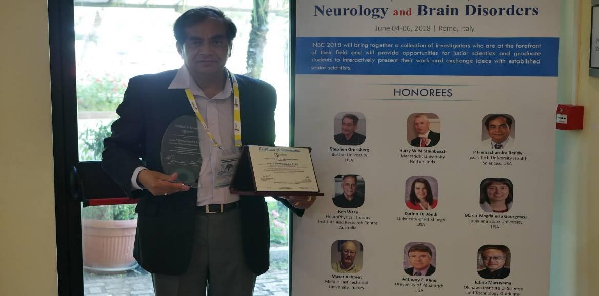 Dr. Reddy with Awards and posters Dr. Reddy with Awards and posters