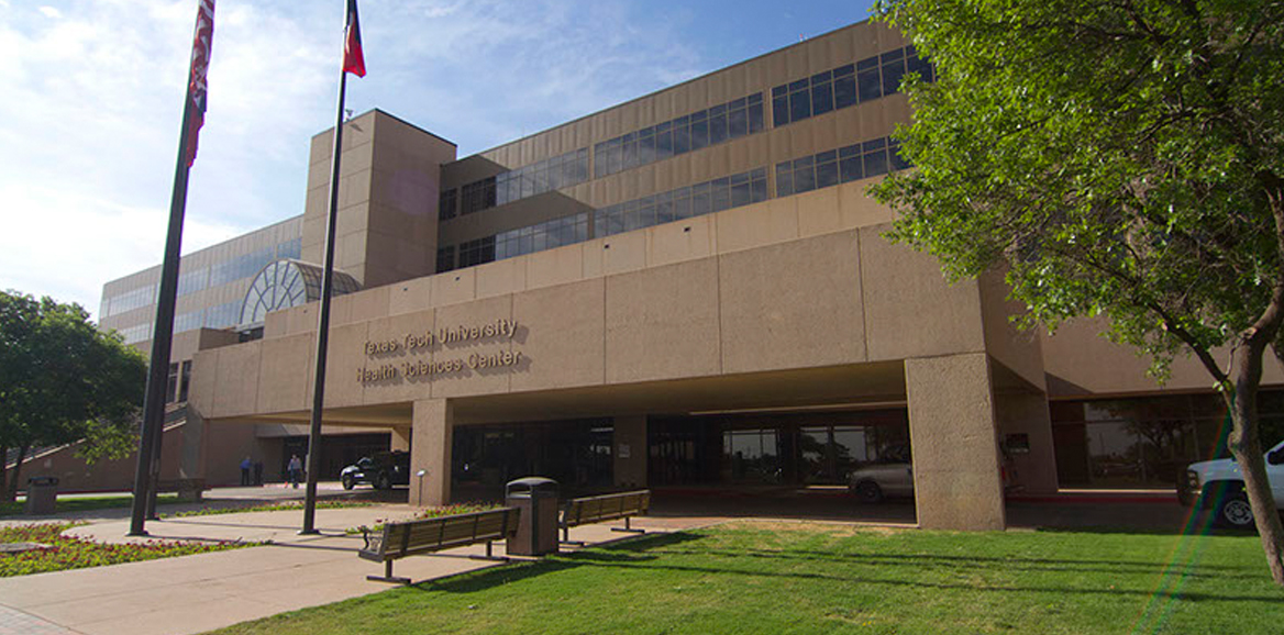 Texas Tech University Health Sciences Center main entrance, flags in front of the building
