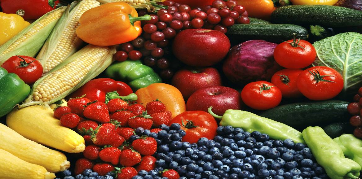 Fresh fruit and vegetables in a fruit basket
