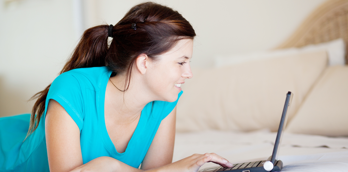 teen on computer