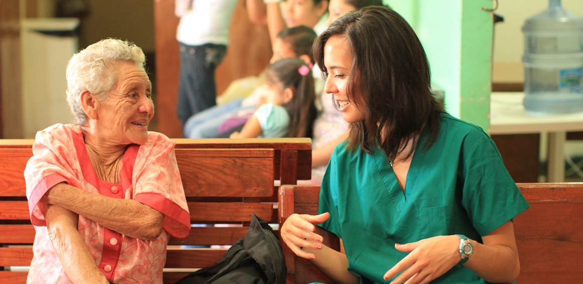 TTUHSC Global Health student talking with patient