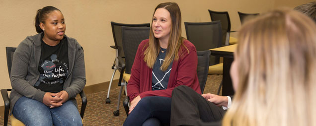 A group counseling session led by a certified counselor