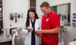 TTUHSC Nursing students with faculty member in Sim Center