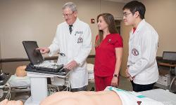 TTUHSC Nursing students with faculty member in Sim Center