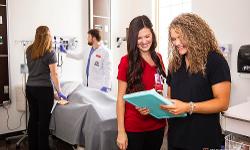 TTUHSC Nursing students with faculty member in Sim Center