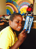 Hamsa had never seen a mirror and had no idea what he looked like! He was fascinated and kept making funny faces.