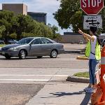 Crossing guard directing traffic