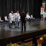 Students receiving their white coats