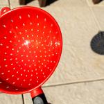 A colander used for viewing a solar eclipse