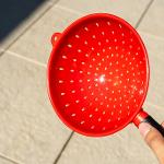 A colander used view an eclipse
