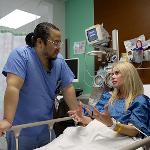 Dr. Alan Pang speaking with Tonya Lambert before the procedure