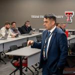Marty Clay addressing TTUHSC staff and faculty at a meeting