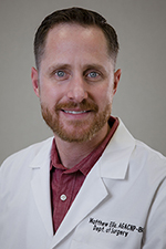 Headshot of Matthew Ellis
