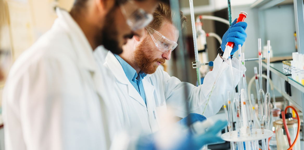 Lab Workers running experiments