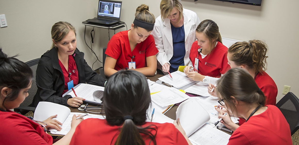 TTUHSC Nursing students around table