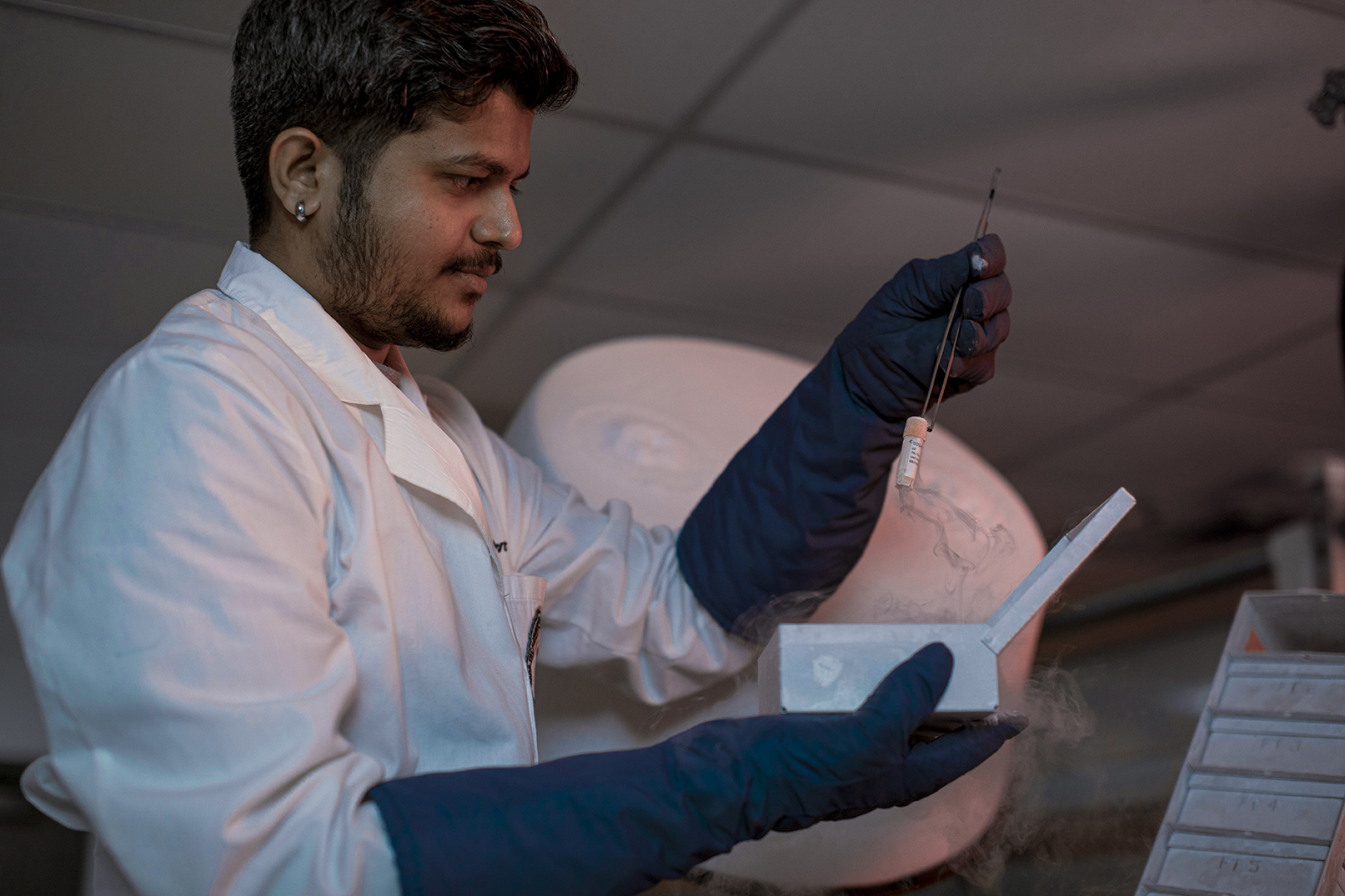 Researcher works in lab Researcher works in state-of-the-art lab