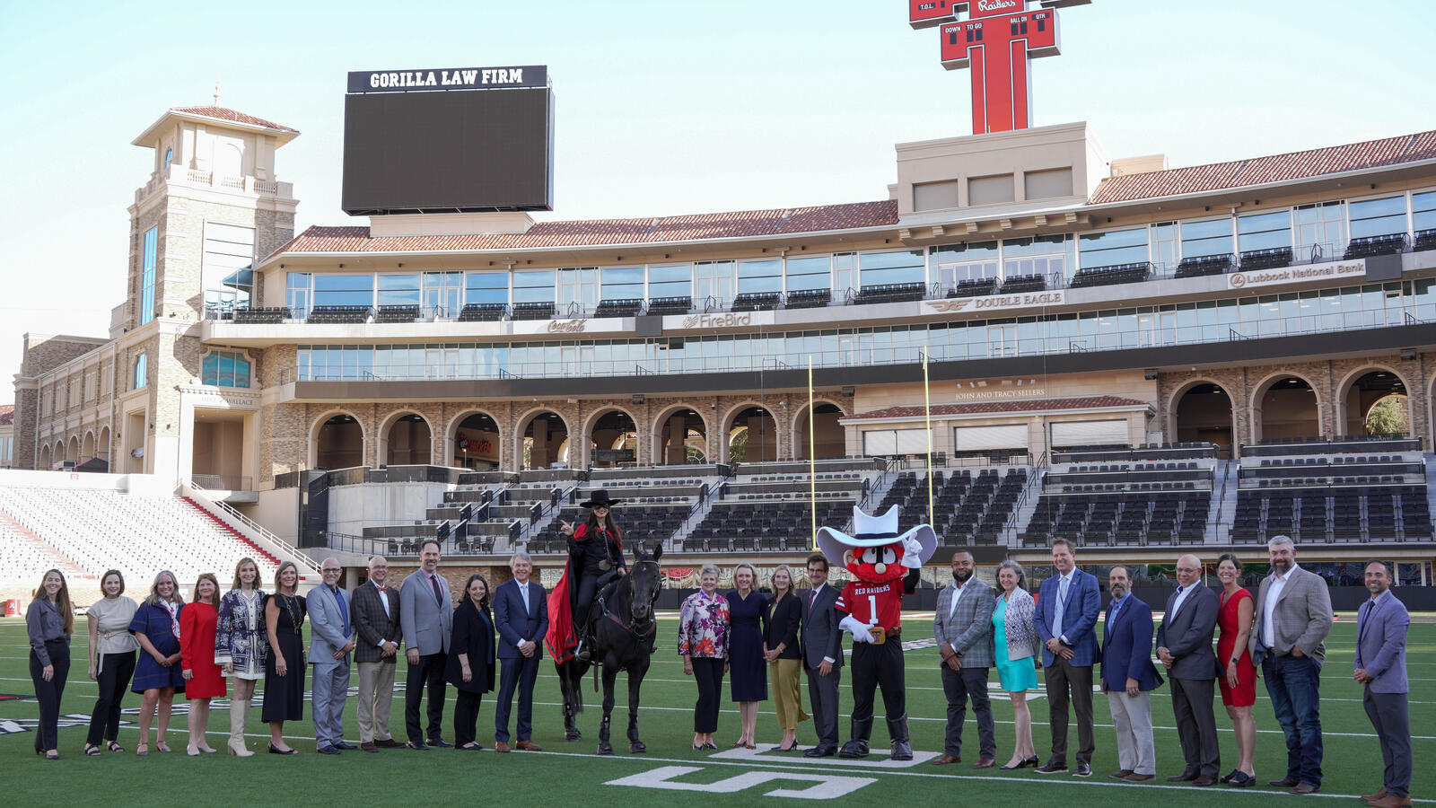 CPRIT Large group photo on the field at Texas Tech Galaxy Stadium