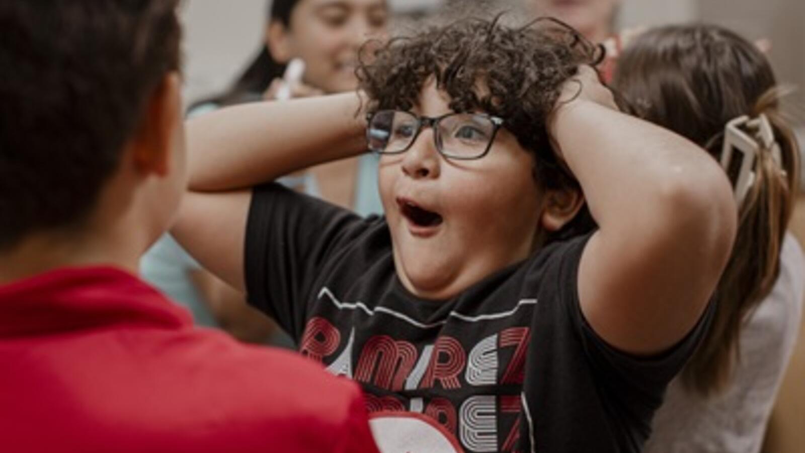 excited elementary school student at Docs for a Day minicamp