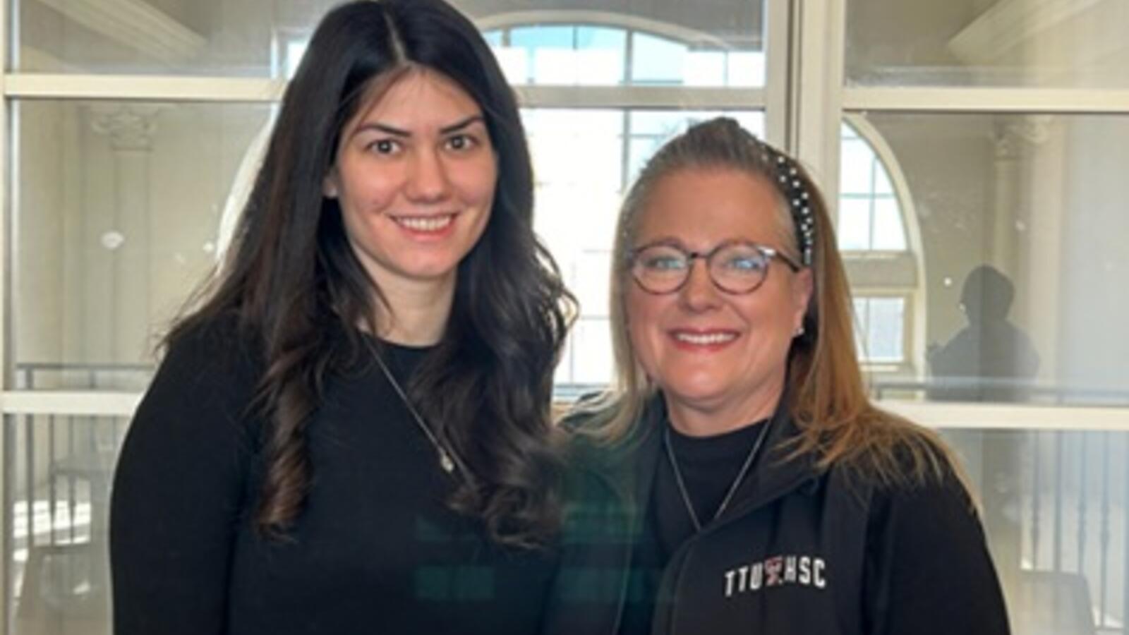 two women smiling