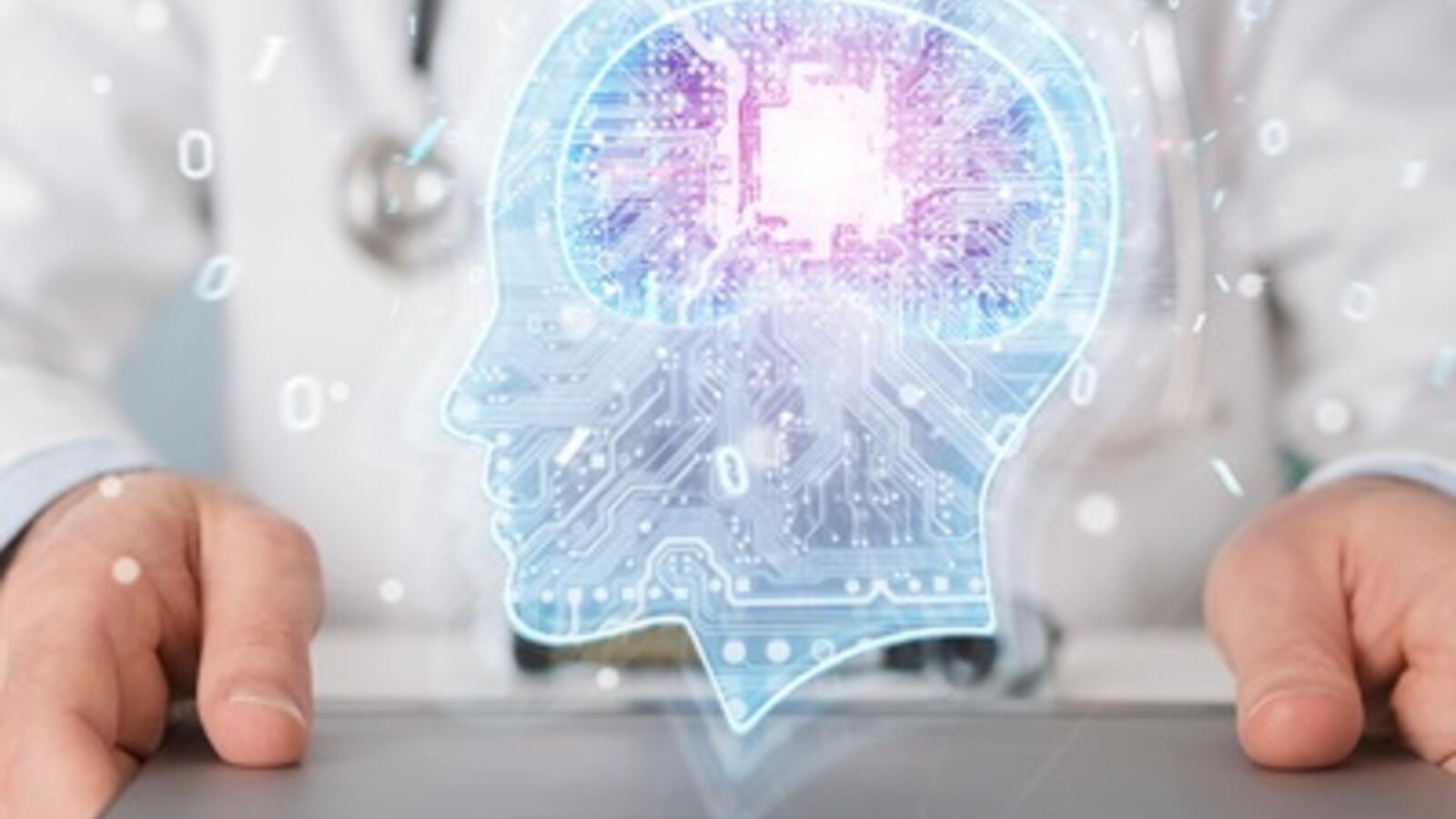 hands holding a tablet with an illustration of a holographic brain projected over it