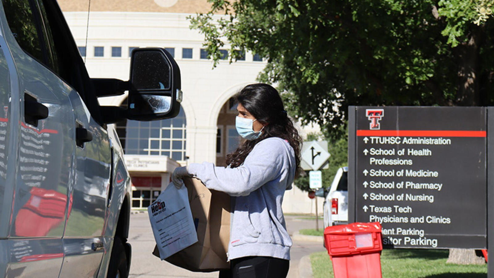 volunteer collecting medication from the medication cleanout in Amarillo