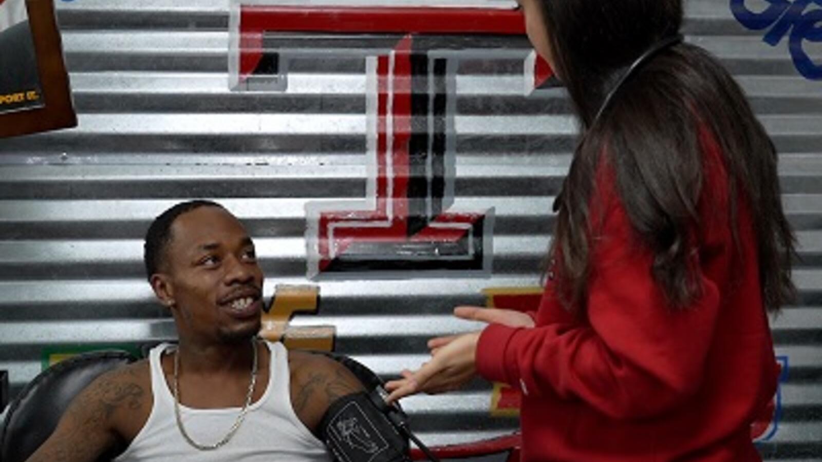 students provide free blood pressure checks at local barber shop