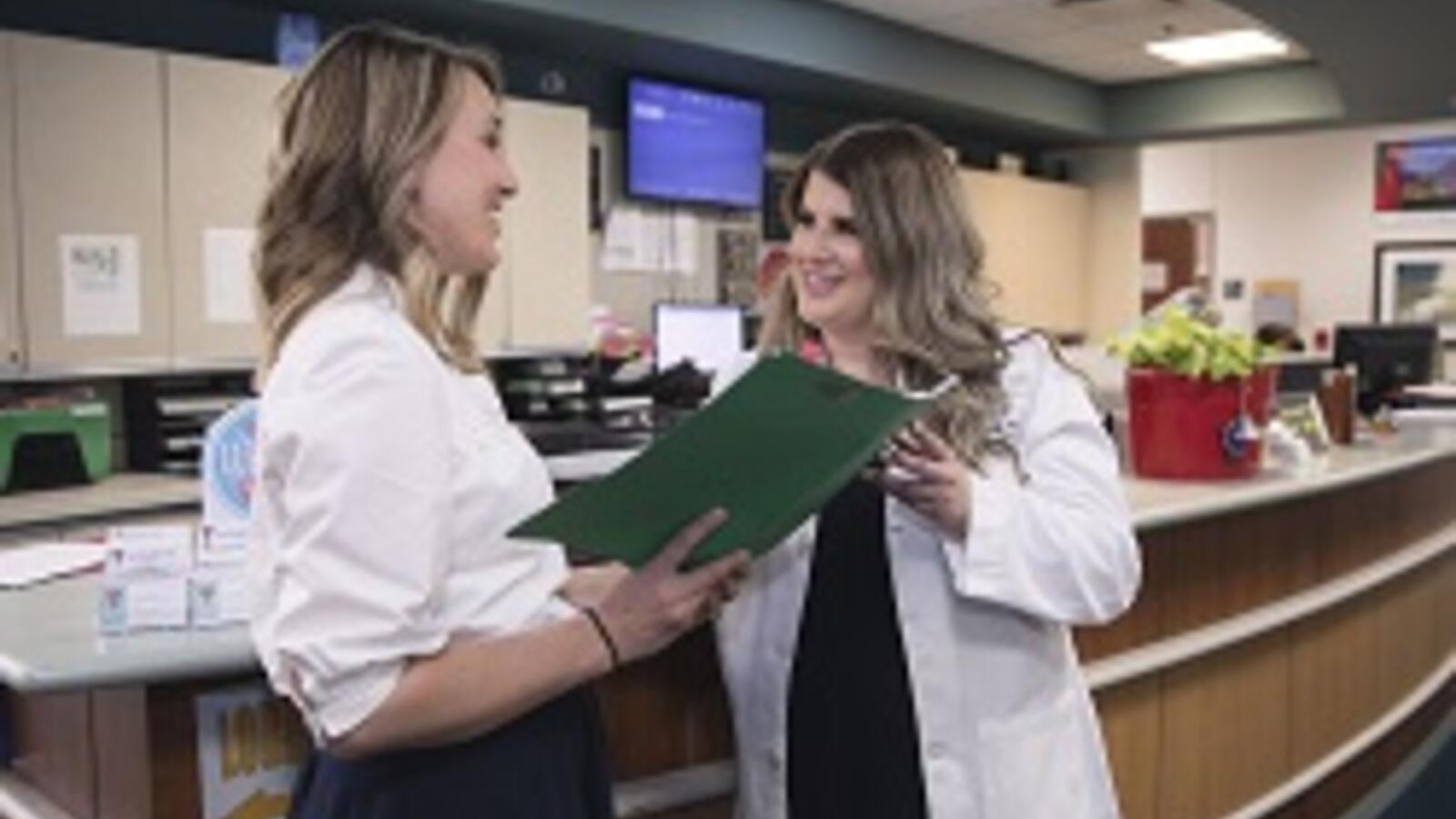 two women in a professional clinical setting