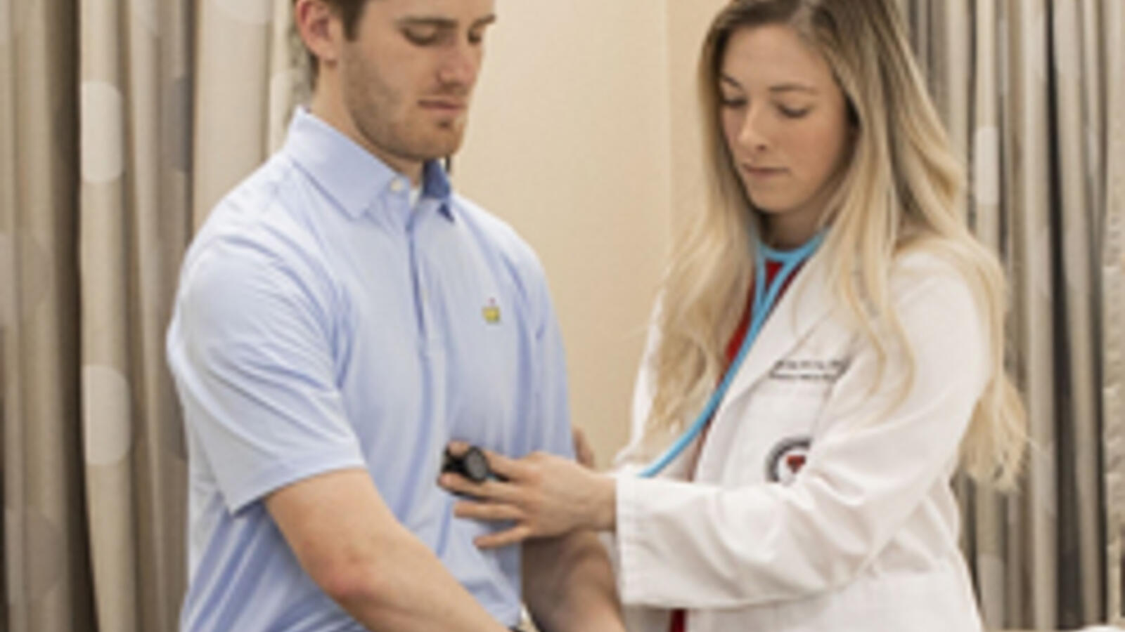 TTUHSC Physician Assistant student with a patient