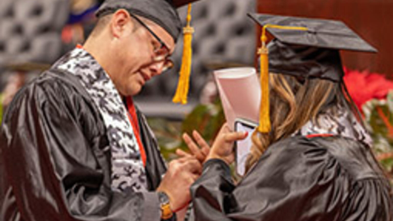 Maugeri and Del Rio proposal at the school of nursing graduation ceremony