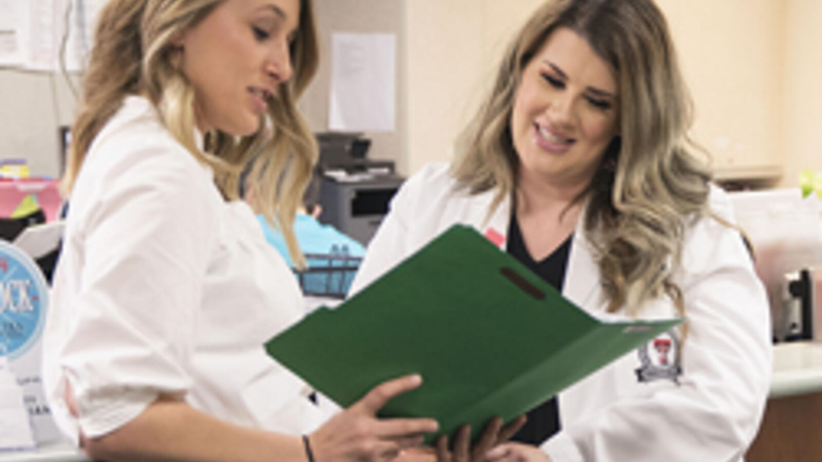 On the Job in Health Care Administration, two administrators visiting.