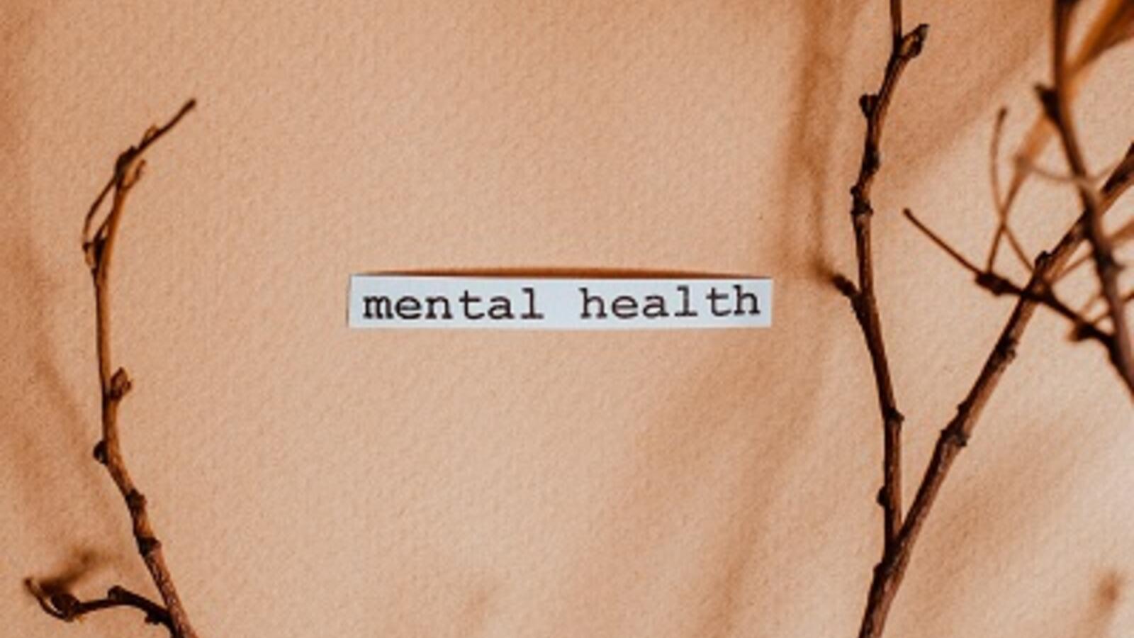 graphic of branches with type that says "mental health"