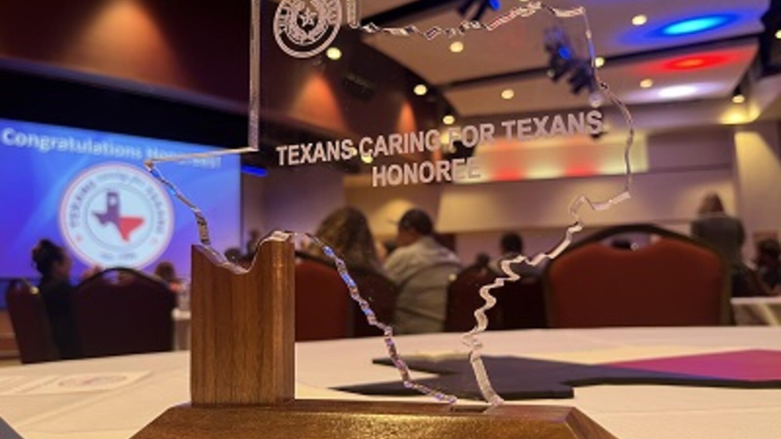 Award plaque for Texans Caring for Texans 2023
