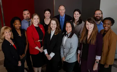 Kenneth H. Cooper Institute faculty and staff pose together for a group photo.