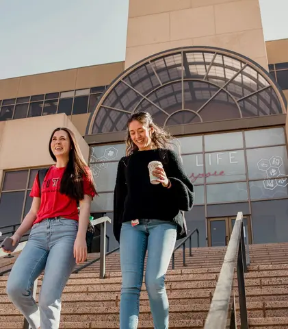 Students walking down the steps outside the TTUHSC Lubbock campus.