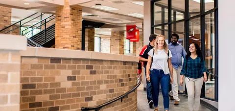 Students walking together inside the TTUHSC Abilene campus.