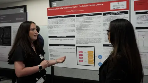 Ashlyn Caddell talking about her research poster on HPV vaccine literacy