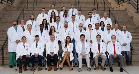 Group photo of Lubbock Dept. of Surgery faculty gathered on a staircase.