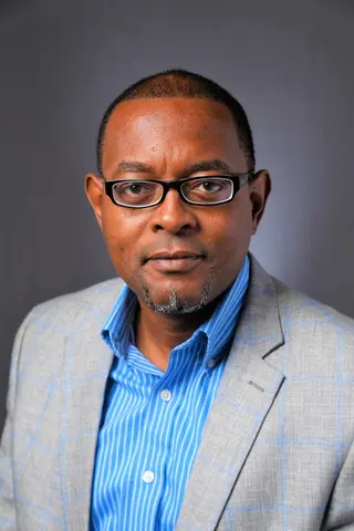 John Gachago, DHA