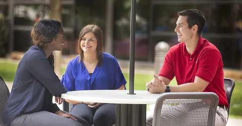 Students talk on campus