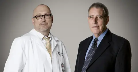 Huton and Reynolds headshot