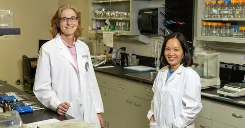 Michaela Jansen, Pharm.D., Ph.D and teammate