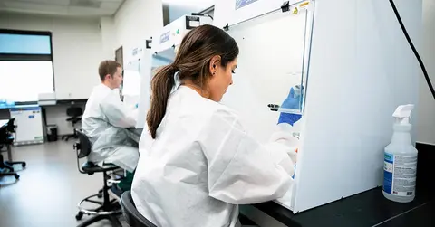 woman working in molecular pathology