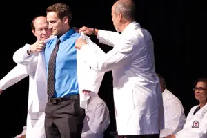 Receiving a white coat is the first right of passage for some medical students.