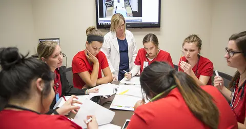 Nursing students in a debriefing 