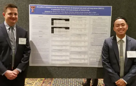 Alex Le with research collaborator Michael Dean