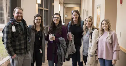 Students pose in hallway for back to school