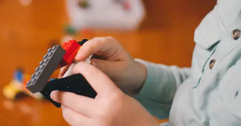 boy's hangs with lego