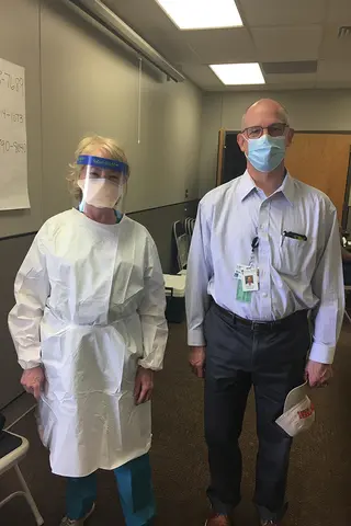 Dr. Cherry and Dr. Cook covid testing