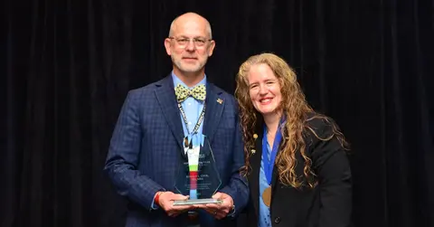 Dr. Ronald Cook with his award for Family Physician 2023