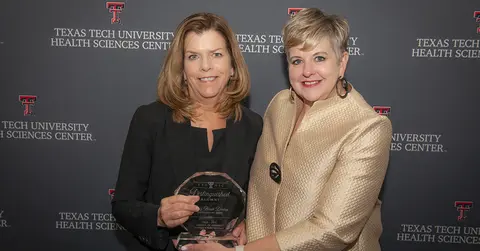 Cyndy B. Dunlap, DNP, RN and President Lori Rice-Spearman
